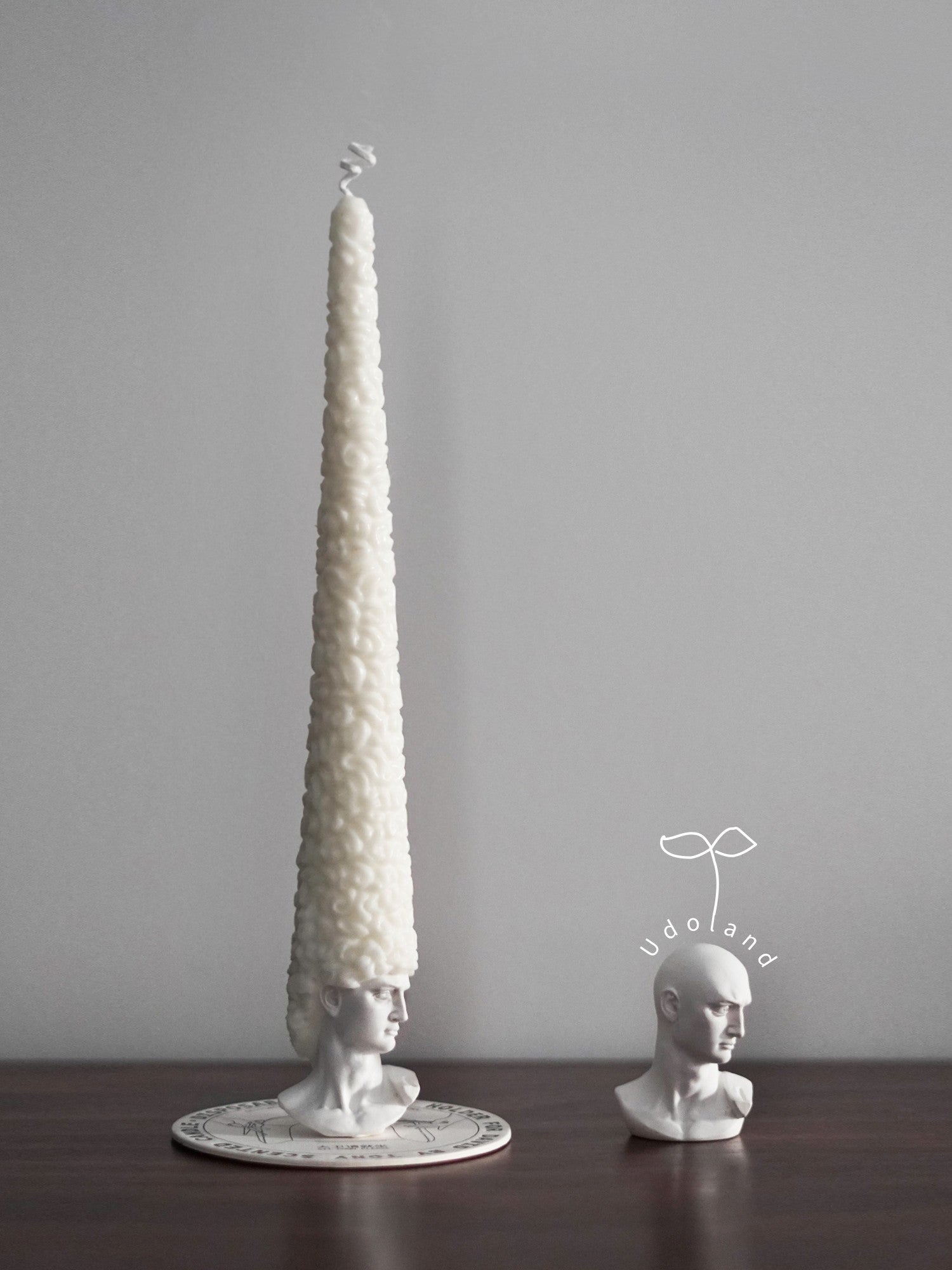 David candle with an unusually tall wax hairstyle
