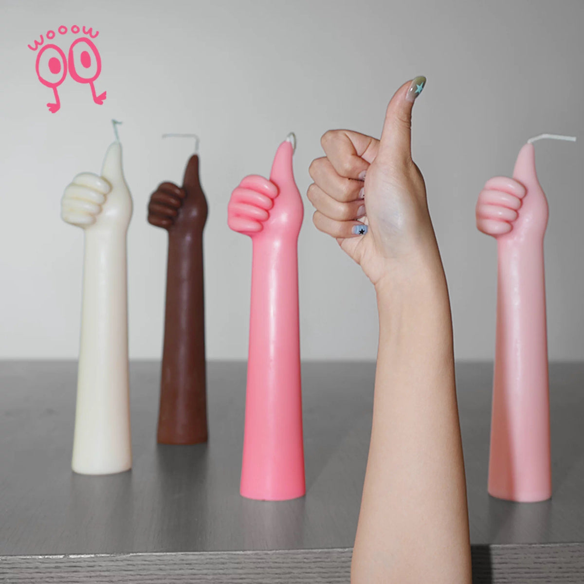 WoooW thumbs-up candles in White, Brown, Light Pink and Hot Pink